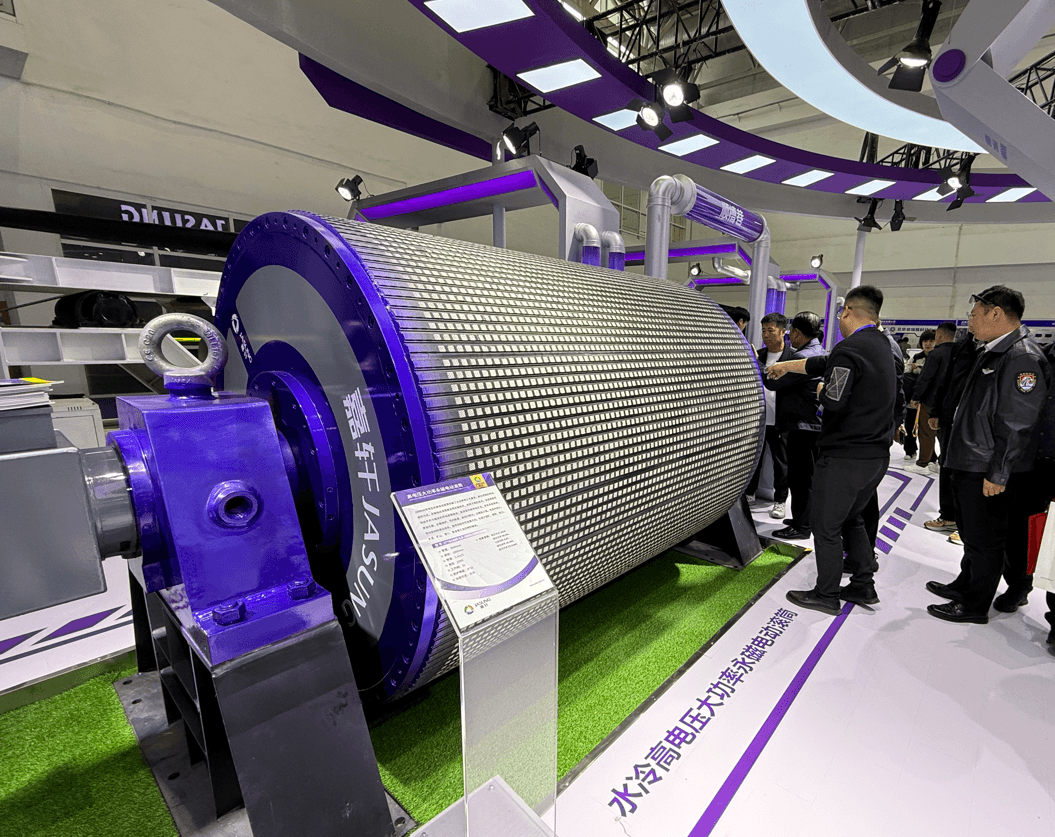 Large purple and silver JASUNG industrial motor drum on display at a trade show exhibition.