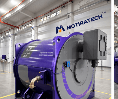 Large purple and grey Motiratech industrial motor positioned on a clean, modern factory floor.