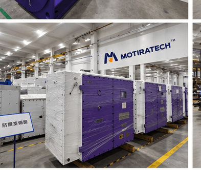 Rows of purple and white industrial enclosures wrapped in plastic inside a Motiratech manufacturing facility.